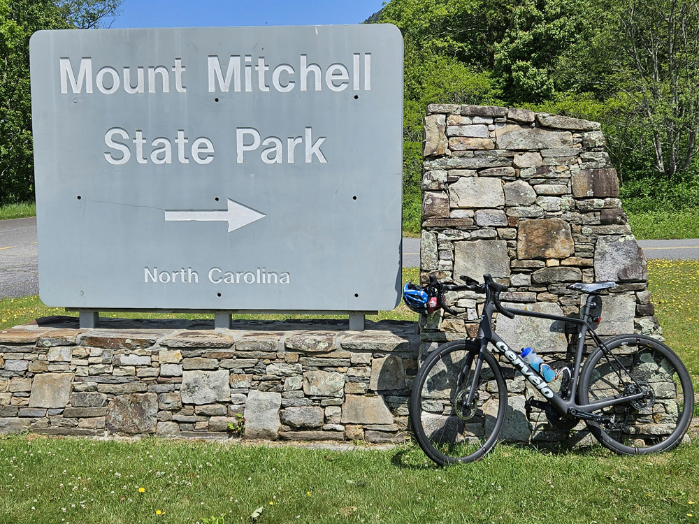 Mount Mitchell State Park sign to the top
